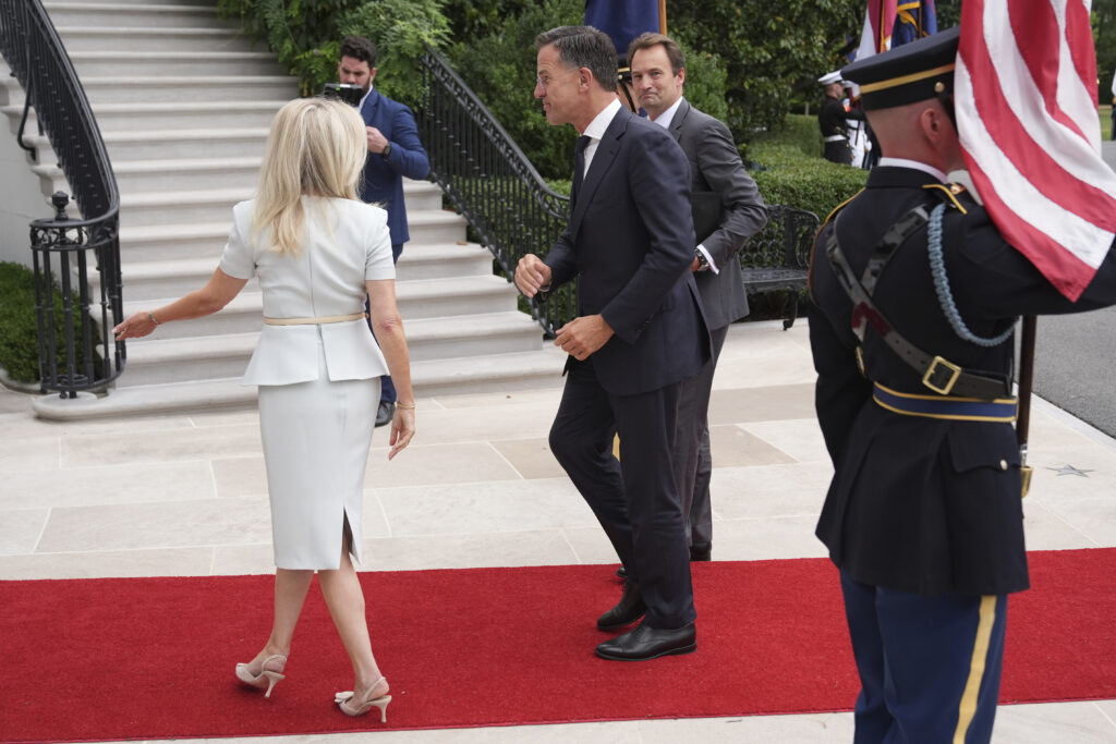 Monica Crowley, White House chief of protocol, from left, greets NATO Secretary General Mark Rutte upon arriving to meet with President Donald Trump and Ukraine's President Volodymyr Zelenskyy, Monday, Aug. 18, 2025, at the South Portico of the White House in Washington. (AP Photo/Jacquelyn Martin)