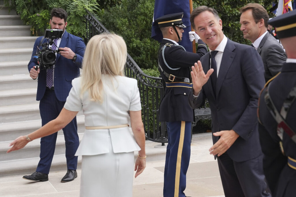 Monica Crowley, White House chief of protocol, left, greets NATO Secretary General Mark Rutte upon arriving to meet with President Donald Trump and Ukraine's President Volodymyr Zelenskyy, Monday, Aug. 18, 2025, at the South Portico of the White House in Washington. (AP Photo/Jacquelyn Martin)